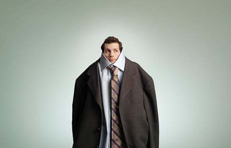 Man wearing oversized suit
